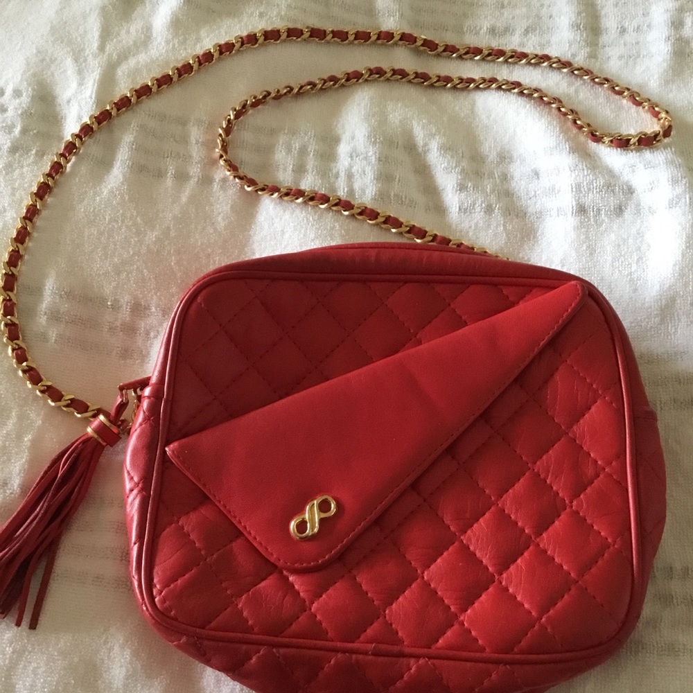 Koret quilted red leather bag with tassel and gold toned braided chain